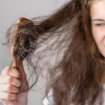 Woman Struggling Brush Hair