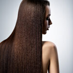 Portrait Of Beautiful Woman With Long Straight Brown Hair